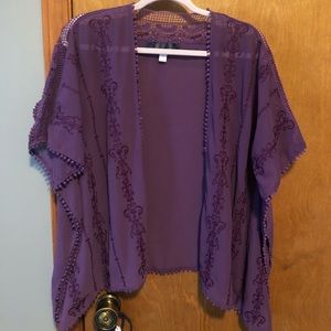 Purple embroidered cardigan.